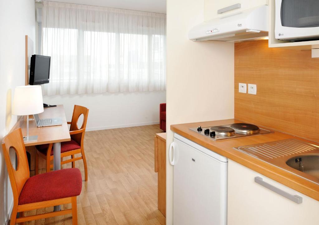 Sejours & Affaires Rennes Longs Champs Aparthotel Quarto foto